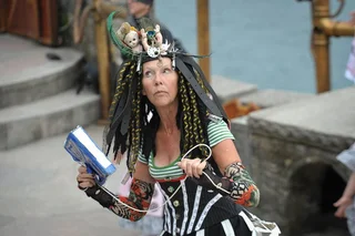 Steampunk warrior costume with black and white stripes and accessories